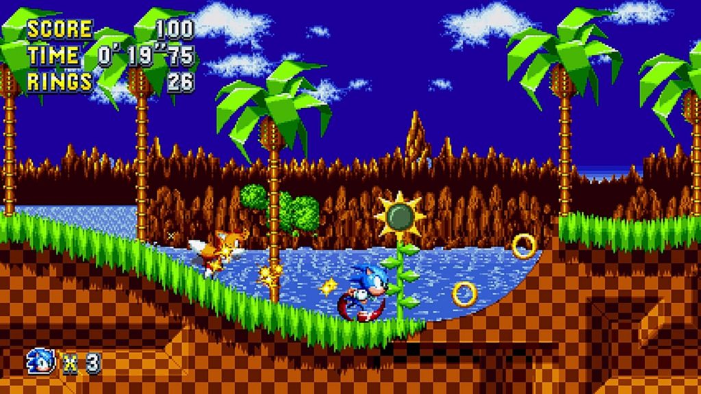 Sonic Mania screenshot of Sonic racing through a colorful pixel-art zone