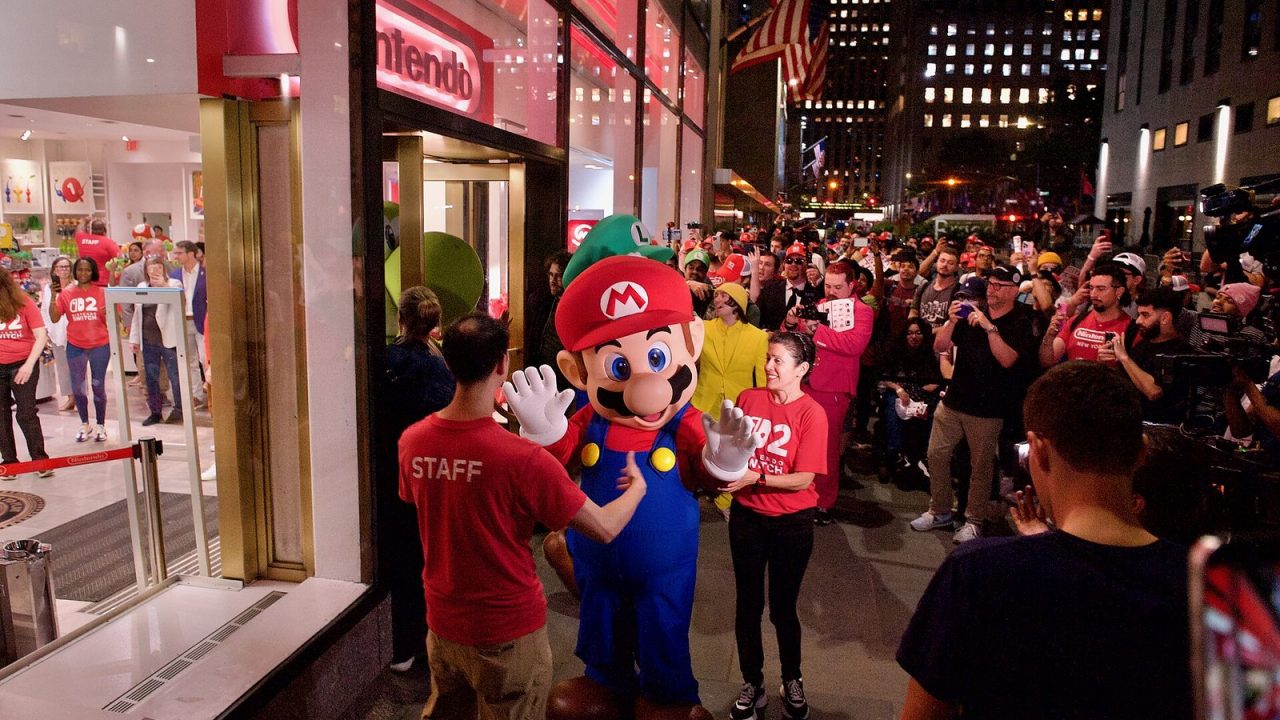 Mario, Luigi, Peach and Yoshi costumed characters greeting fans at Nintendo New York