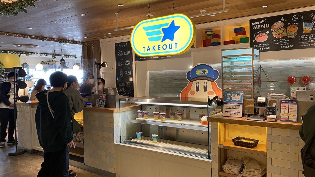 Takeout counter with a Waddle Dee sign at the Kirby Café in Nagoya, Japan