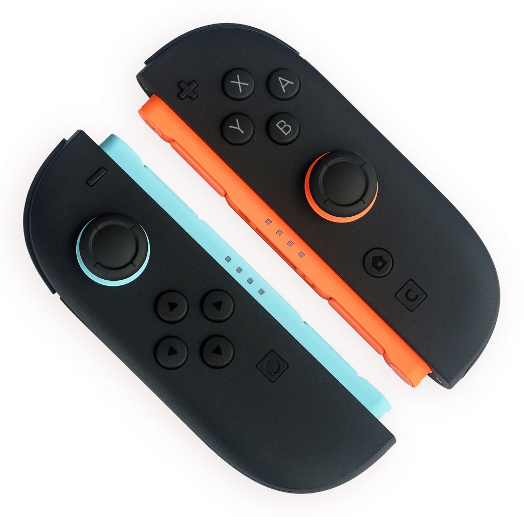 A pair of Joy-Con 2 controllers with blue and orange accents