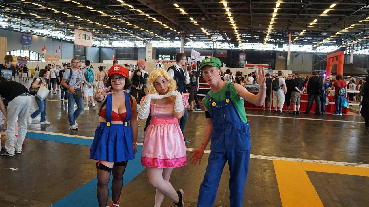 Cosplayers dressed as Mario, Princess Peach and Luigi at Japan Expo 2016